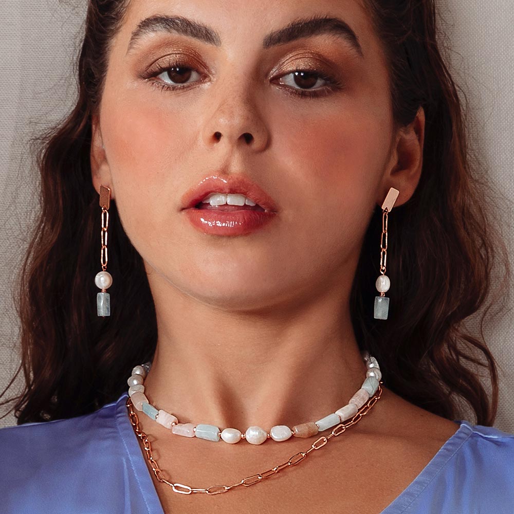 Aimee freshwater pearl and stone multi-way necklace worn double layer with blue cocktail dress.