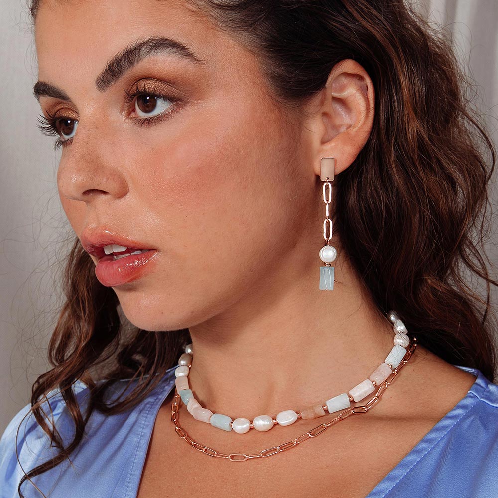 Aimee freshwater pearl and stone multi-way necklace worn two layered and earrings left side.