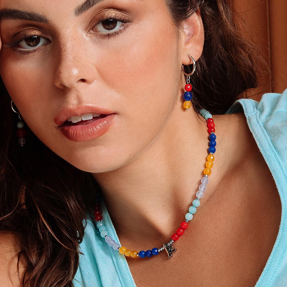 Bianka beaded multicolour stone initial necklace with earrings on left ear