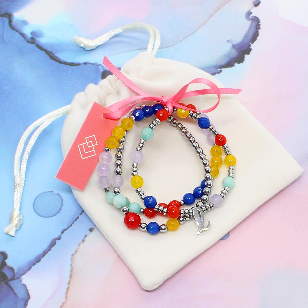 Bianka beaded stone bracelet set with initials tied with ribbon and gift bag