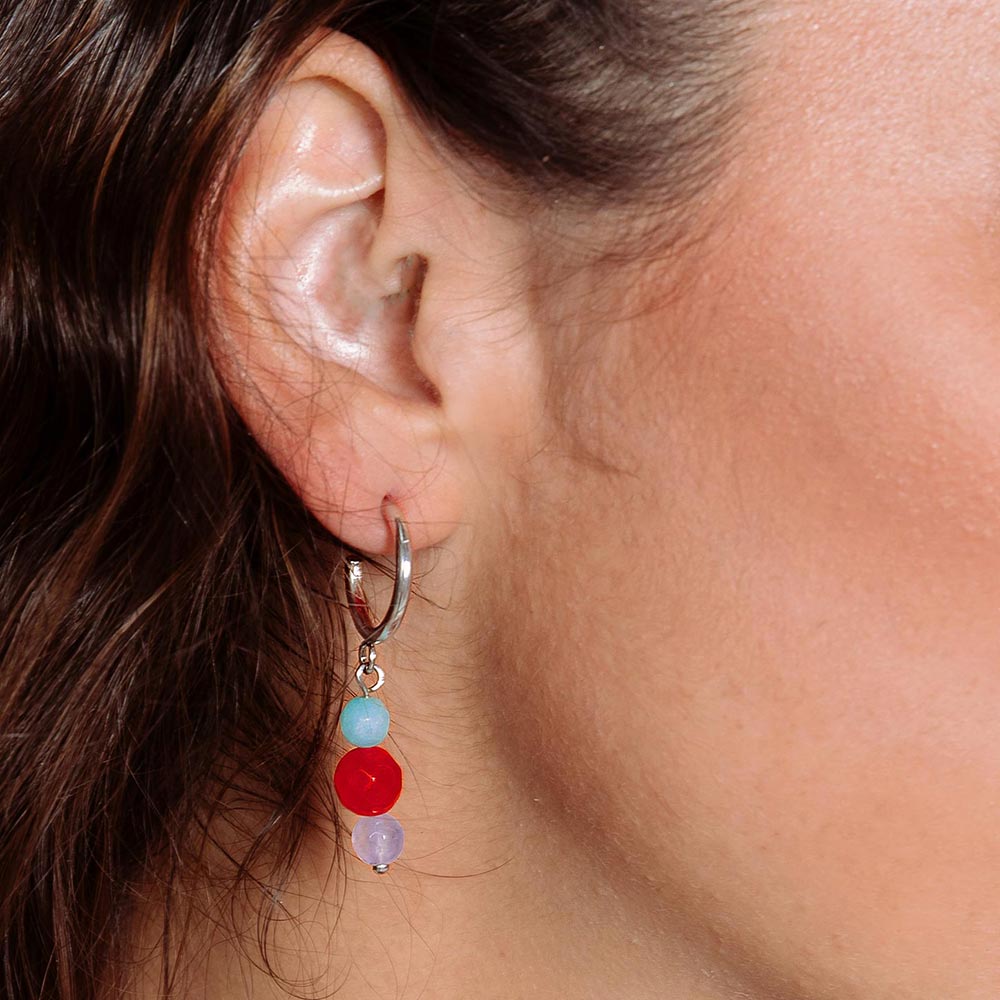 Bianka hoop earrings with mixed stone drops right ear close up.