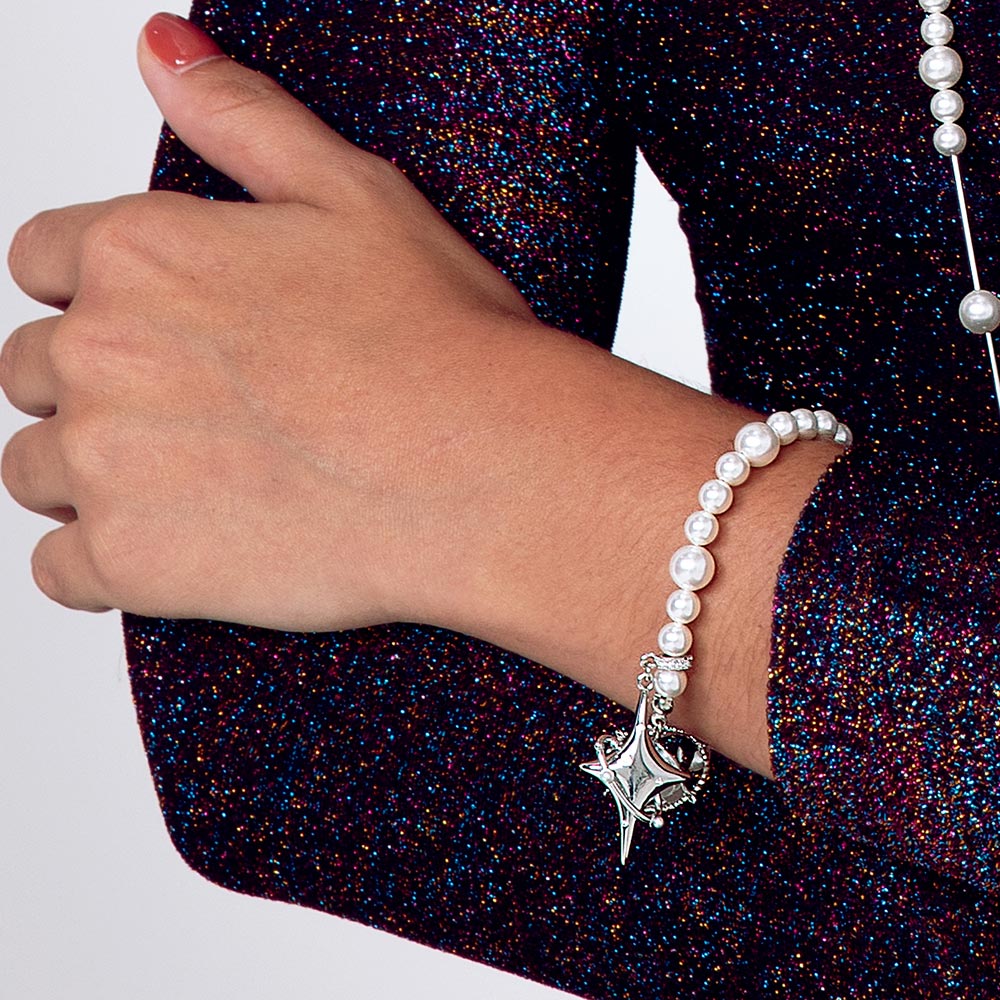 Duchess celestial pearl charm bracelet left hand over right arm