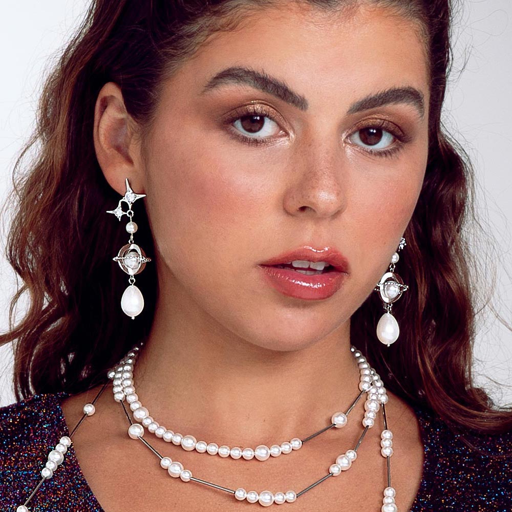 Duchess celestial silver and pearl drop earrings and top of Duchess pearl necklace.