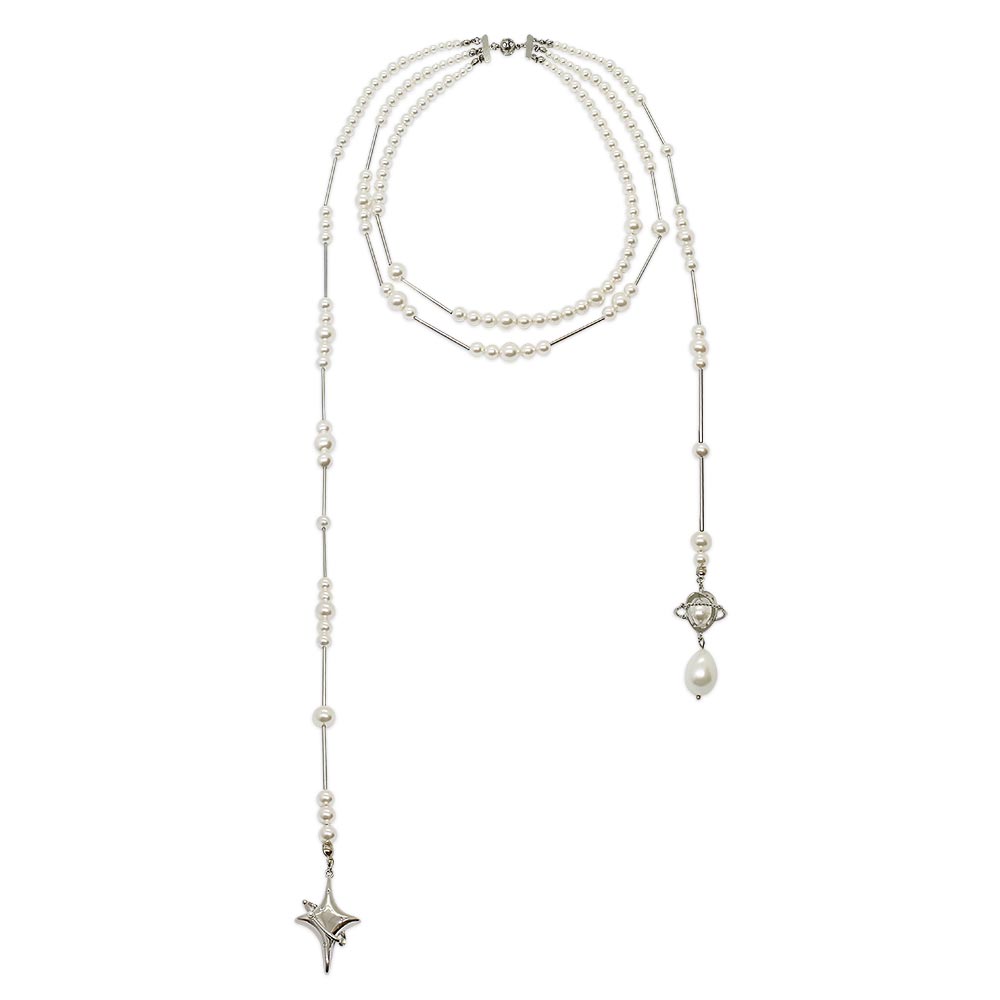 Duchess multi-strand asymmetrical pearl necklace on white background