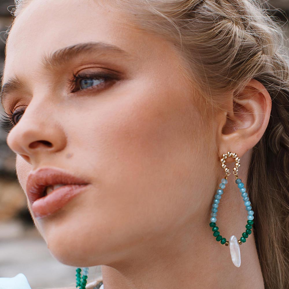 Halley colourful stone and pearl earrings emerald and aquamarine with gold left ear