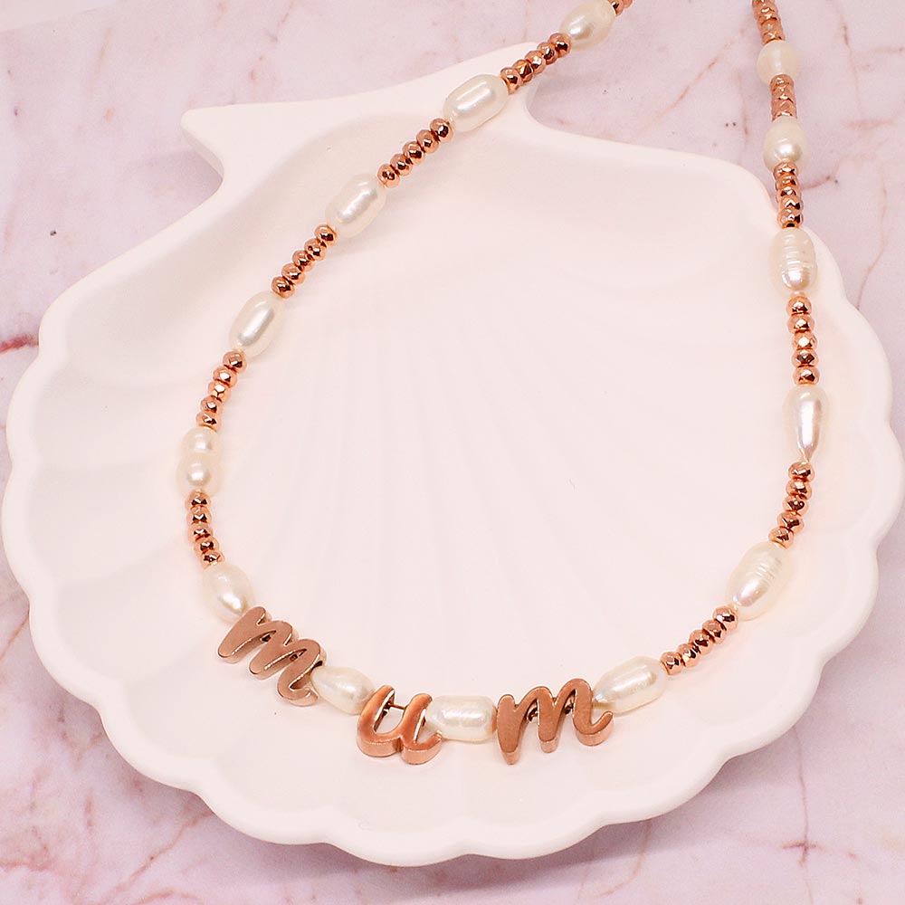 Tarni personalised rose gold and pearl initial necklace with letters m u m on shell dish. Great gift idea for mum