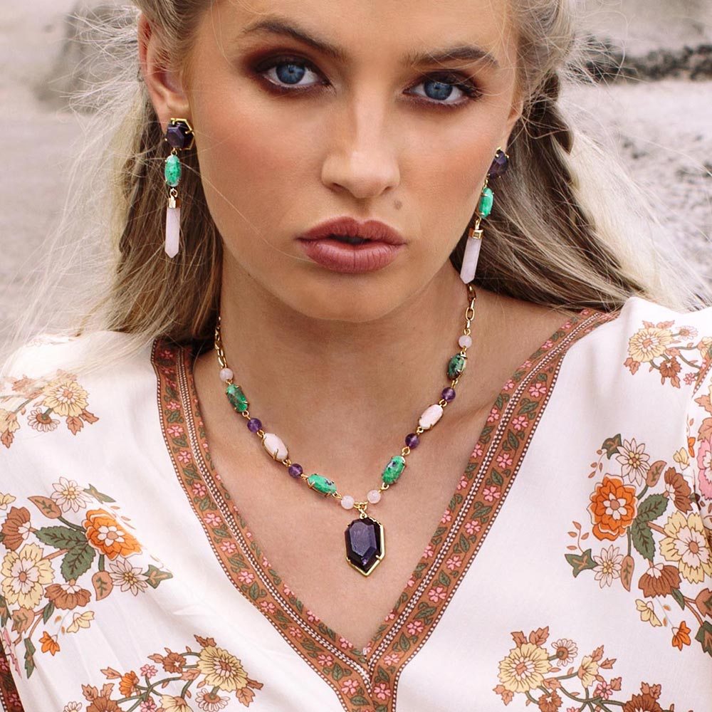 Wylda bohemian multi stone necklace front view. With turquoise, amethyst, rose quartz and gold earrings pair.