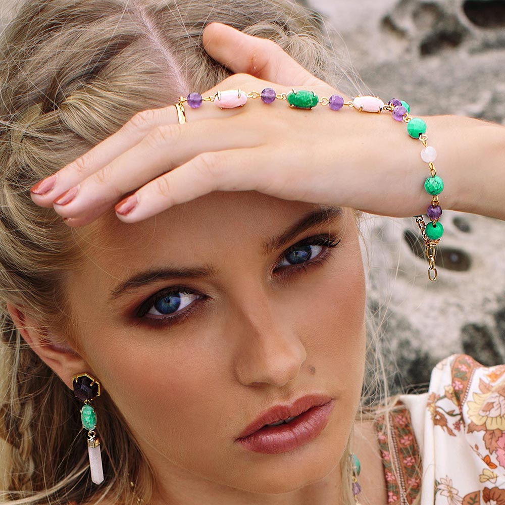 Wylda bohemian slave bracelet ring. Turquoise, amethyst, rose quartz and gold bracelet on left hand over head