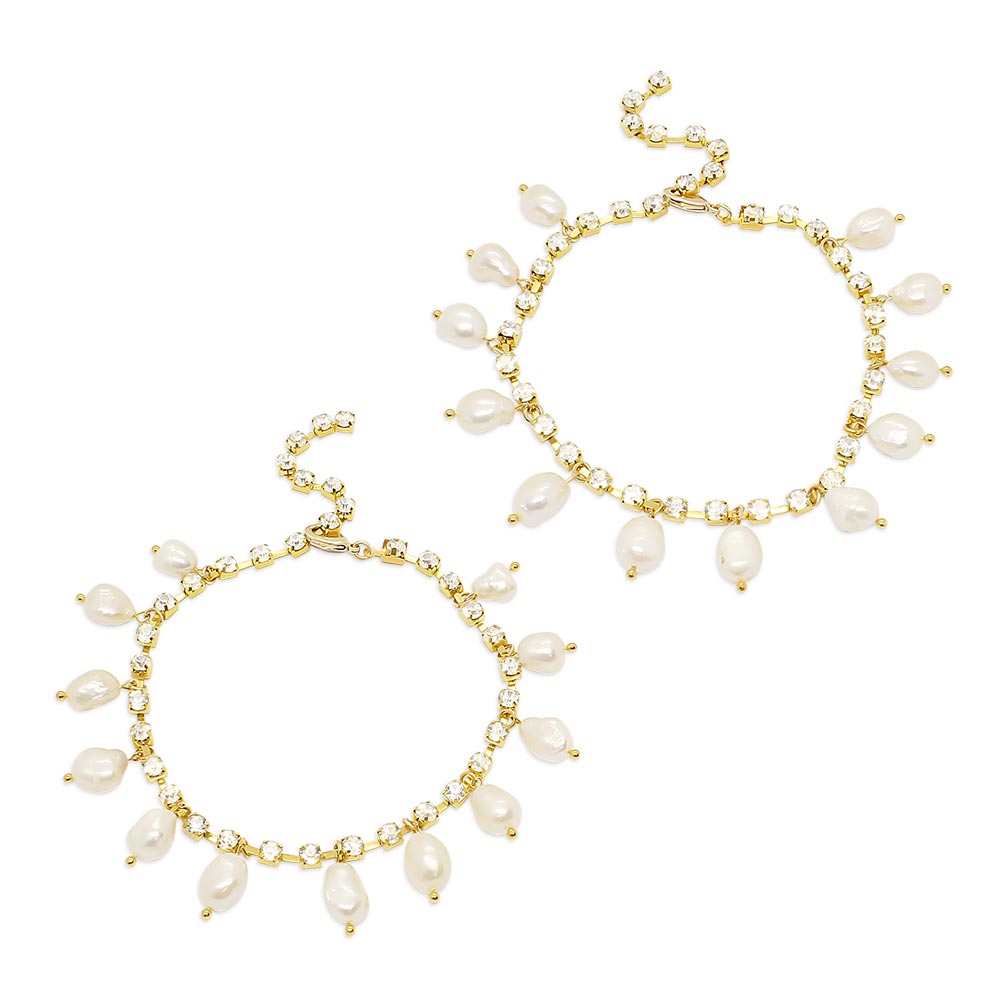 Kaia crystal and freshwater pearl anklets in gold on white background