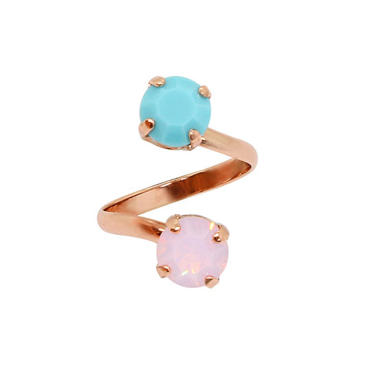 Front view of Jayda pink and turquoise Swarovski crystals ring set in rose gold on white background