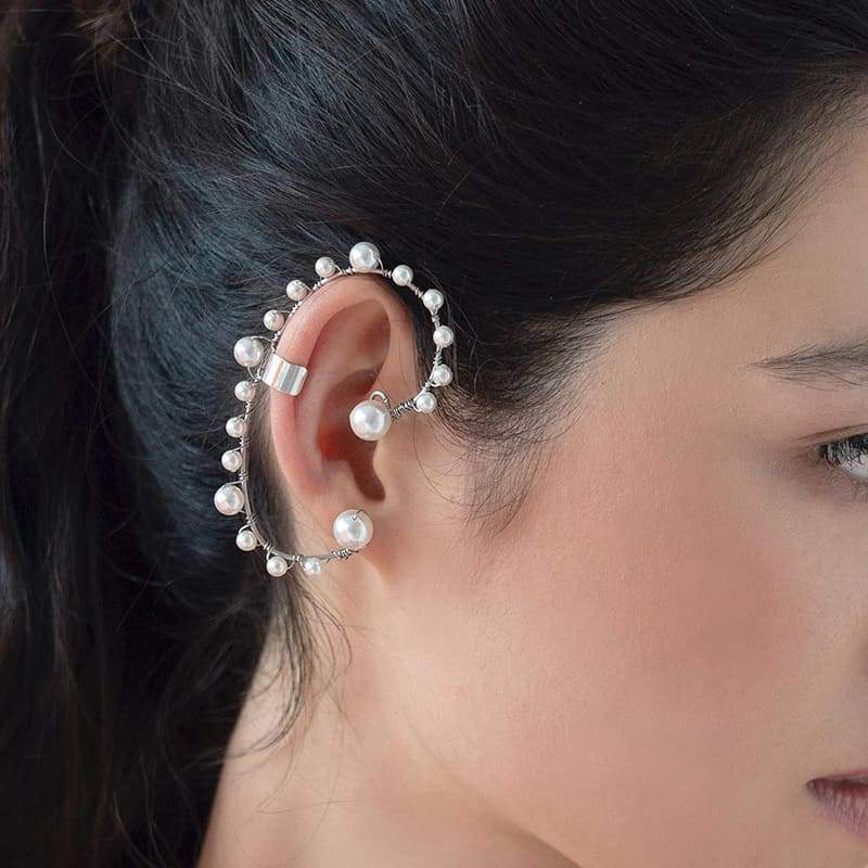 Off-white Ora Pearl Ear Climber on right ear