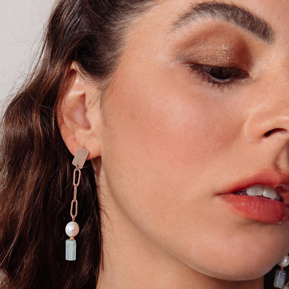 Aimee freshwater pearl and morganite stone earrings on right ear close up