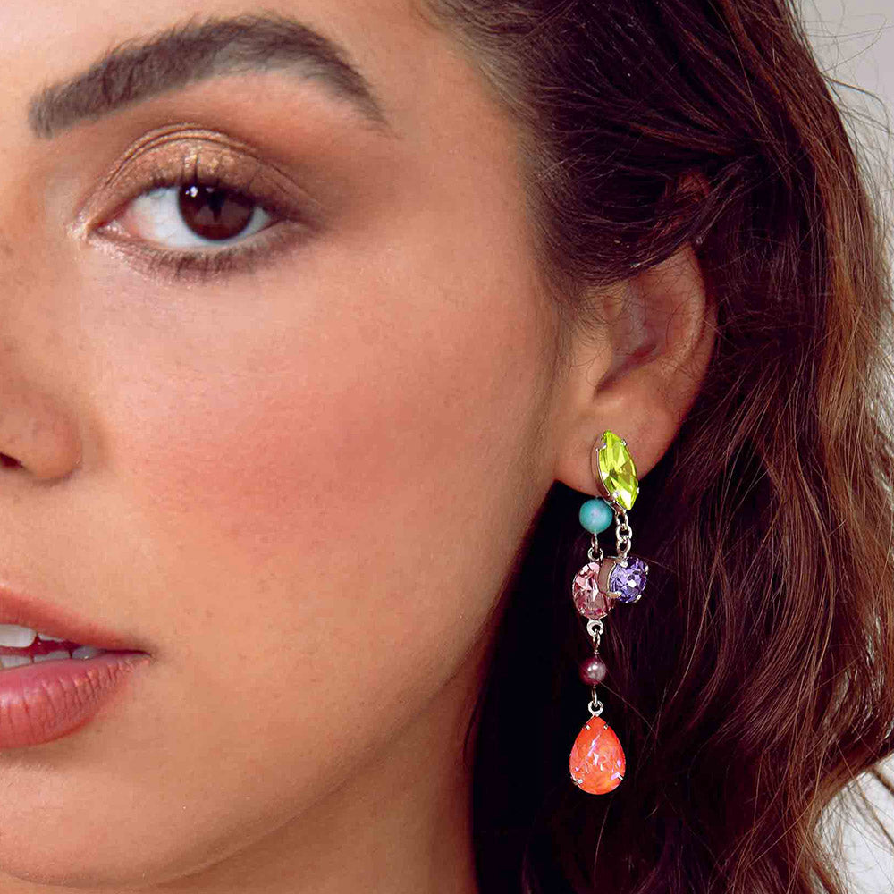 Freda colourful crystal asymmetrical earrings short side on left ear close up