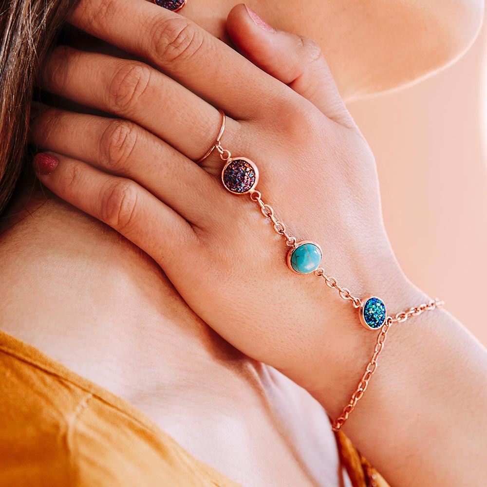 Jorja druzy ring bracelet chain rose gold multi-colour stones close up left hand on neck