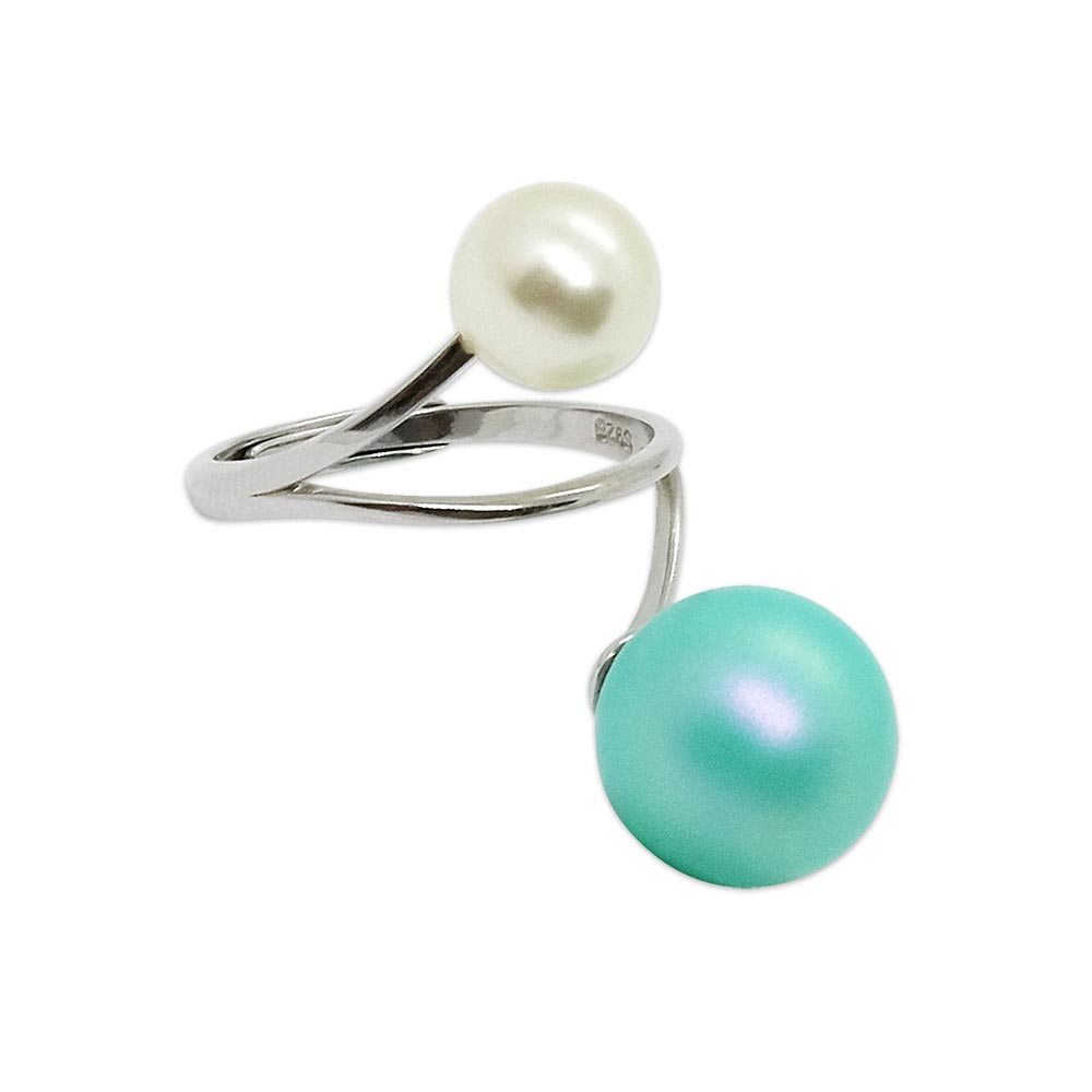 Silver ring with a white pearl and a blue pearl on a white background