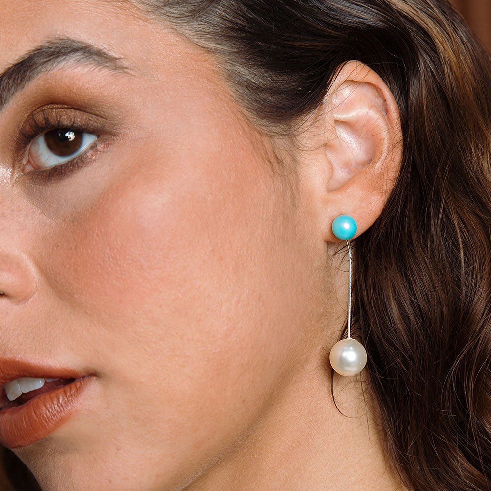 Nerina mixed pearl drop earrings close up left ear