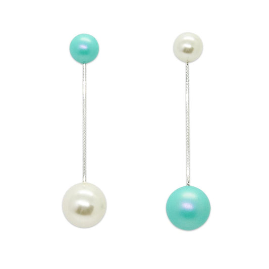 Nerina mixed pearl drop earrings on white background