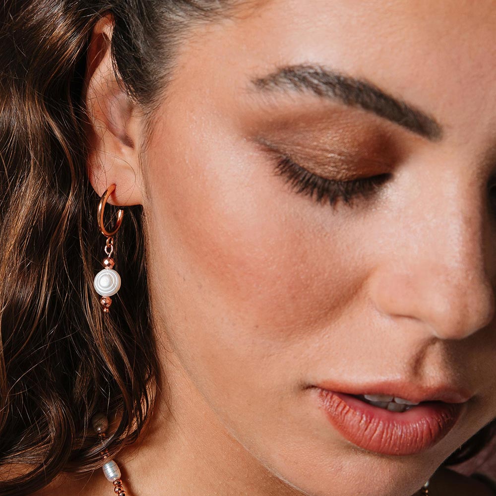 Tarni freshwater pearl rose gold hoop earrings right side close up.
