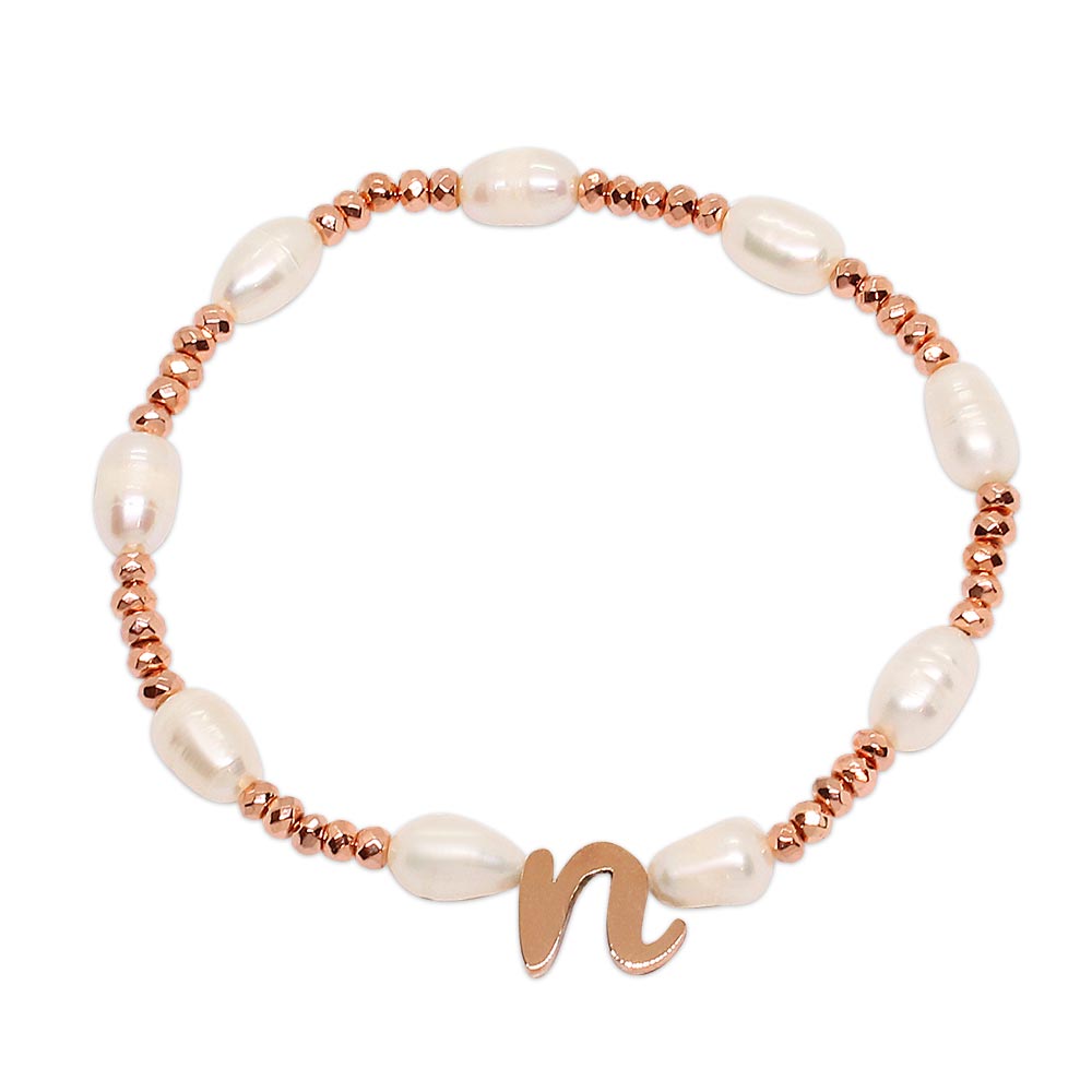Tarni pearl and rose gold initial bracelet set single style one with n initial on white background