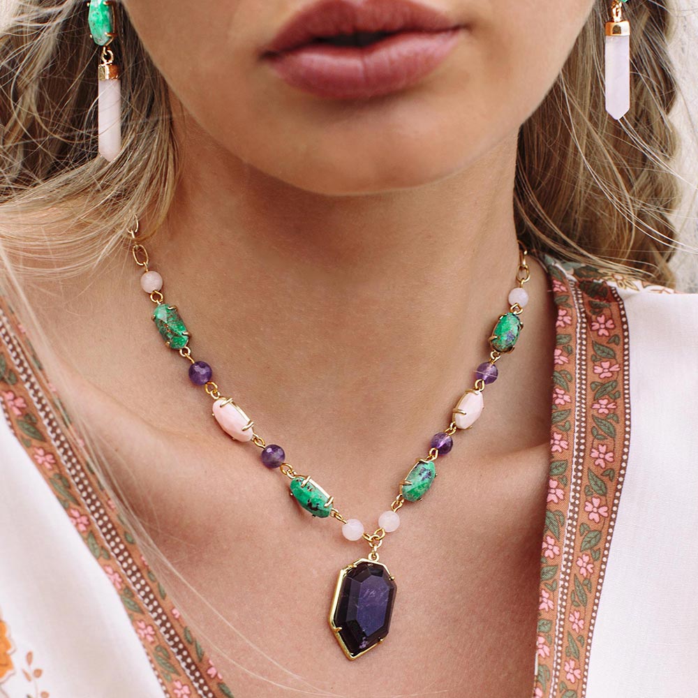 Wylda bohemian multi stone necklace close up. Turquoise, amethyst, rose quartz and gold necklace
