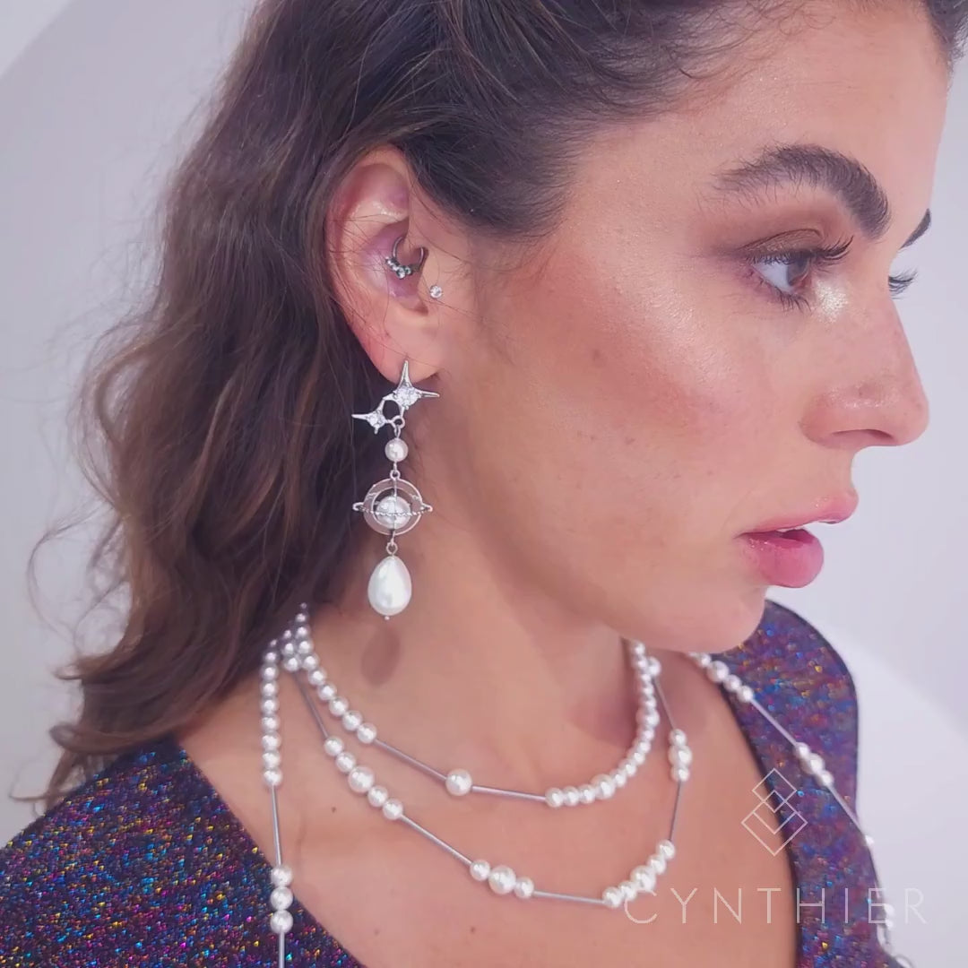 Duchess earrings on left ear and Duchess earring cuff on the right ear.