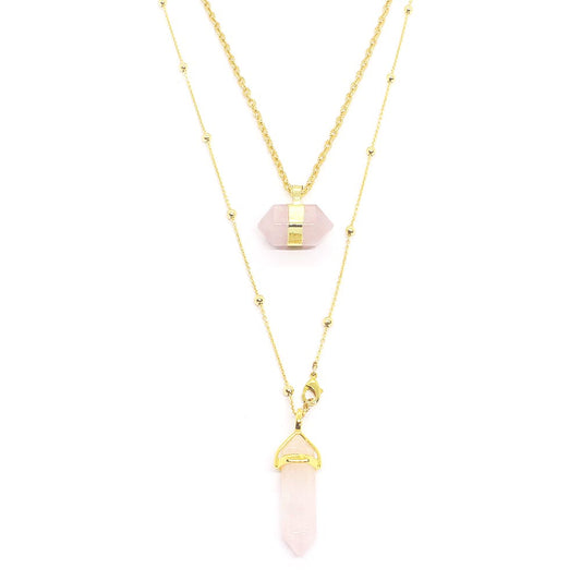 Chakra stone pendant necklaces for layering pink rose quartz and gold close up
