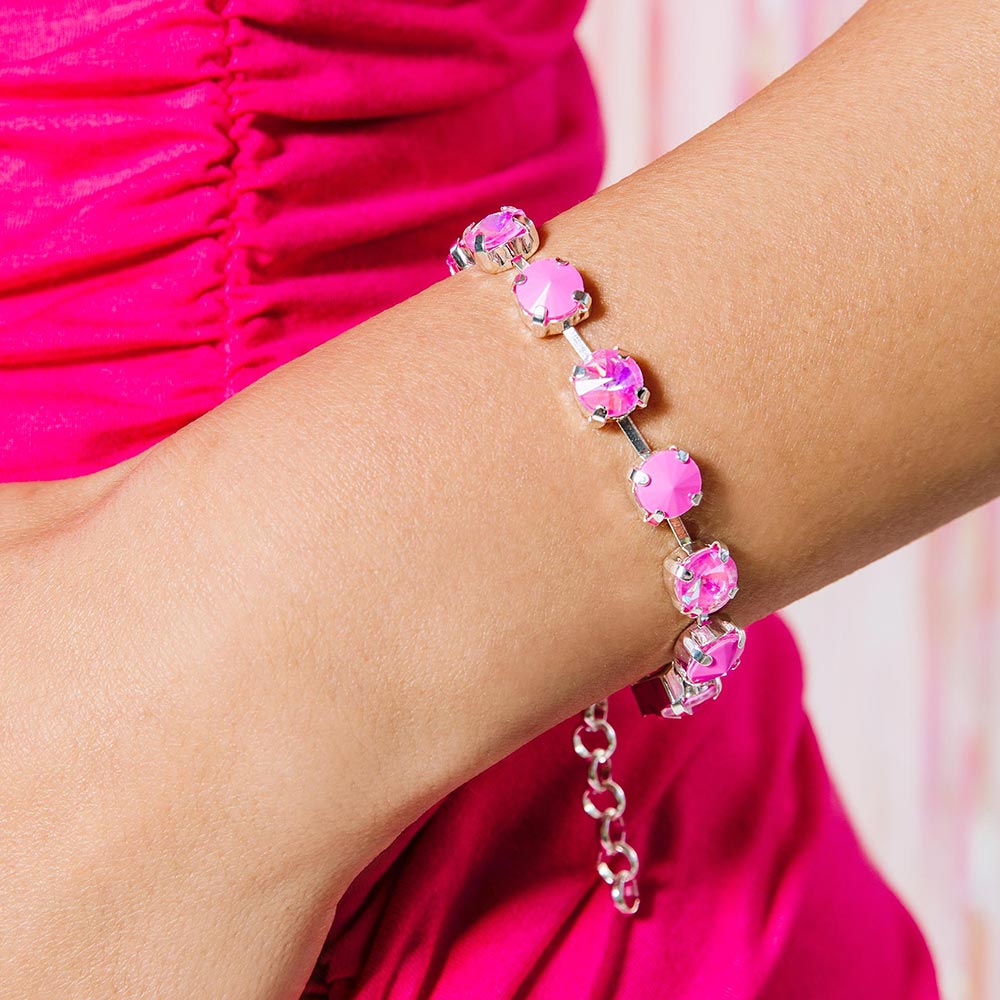 Daiquiri neon crystal bracelet, neon pink bracelet close up hand on waist
