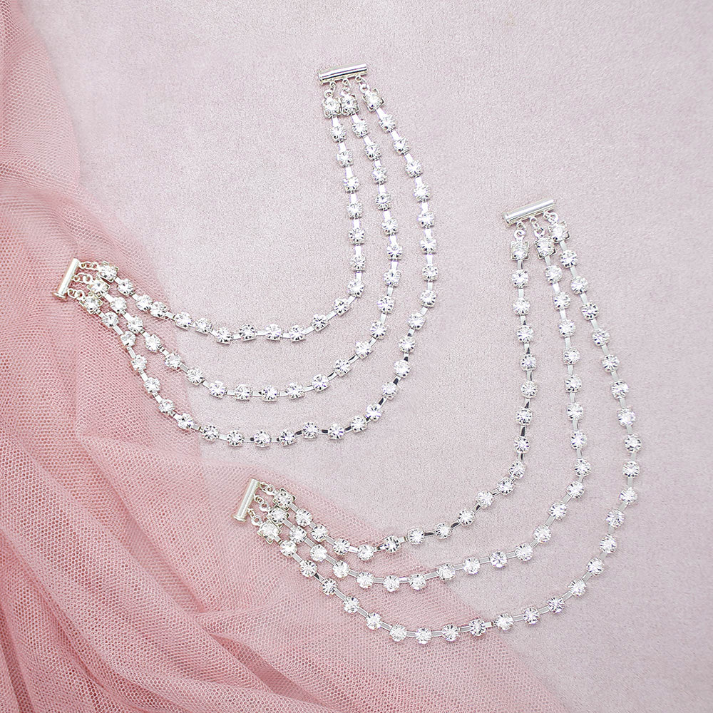 Deva crystal anklets for wedding open on pink background.