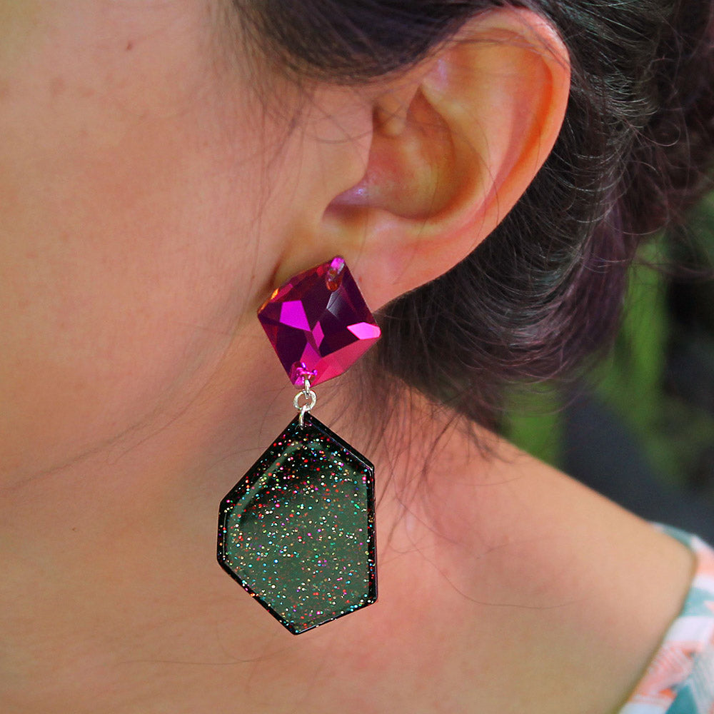 Close up Galaxy earrings pink on ear