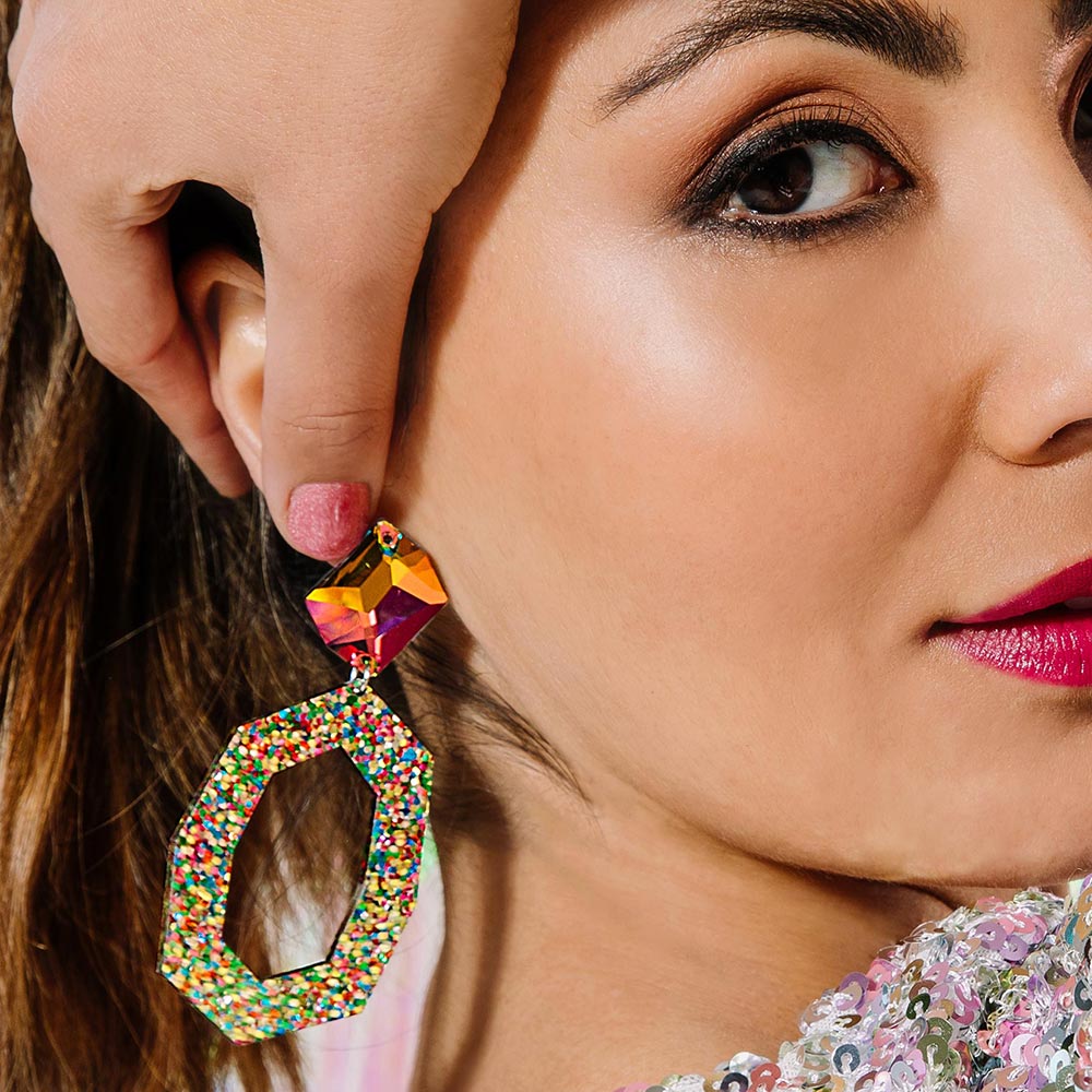 Jaci crystal and glitter earrings rainbow right side hand over ear