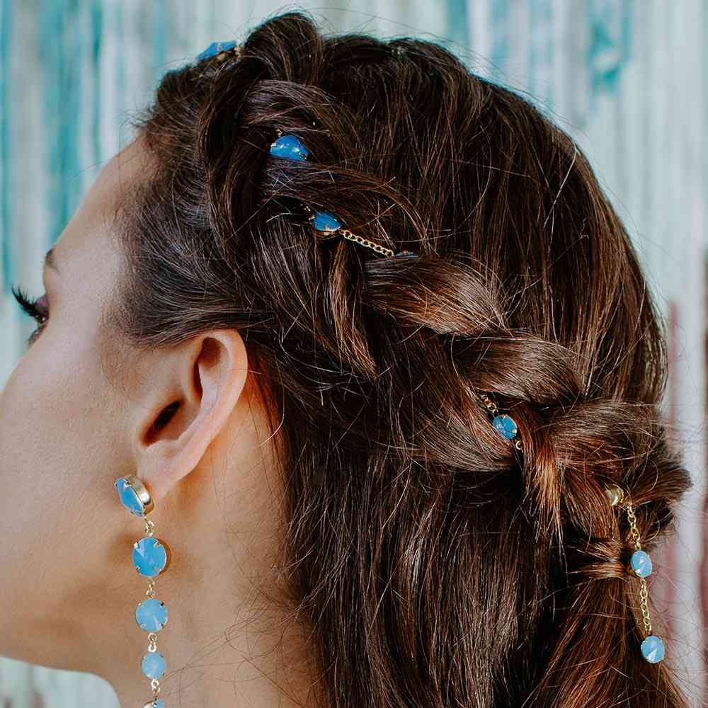Kelsey Crystal Hair Chain in Blue weaved into braids