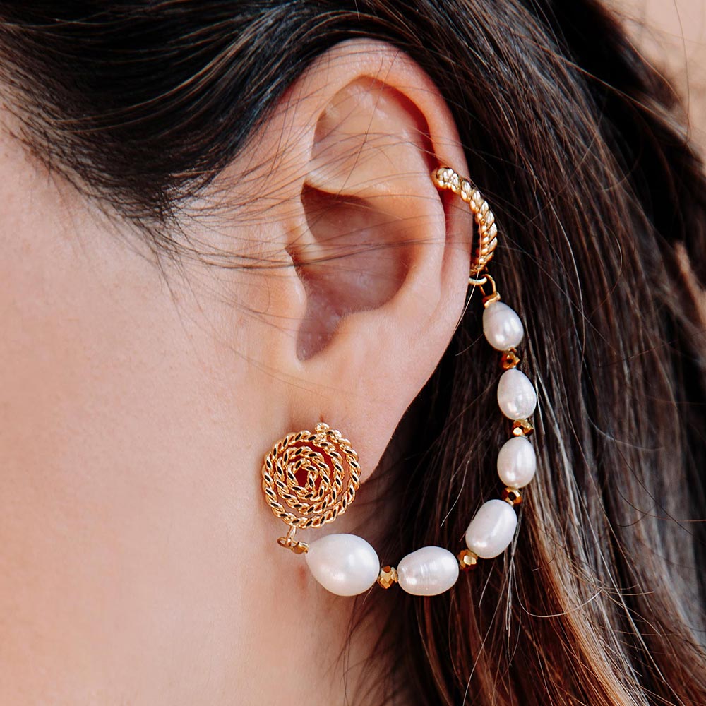 Umiko freshwater pearl ear climber earring close up on left ear
