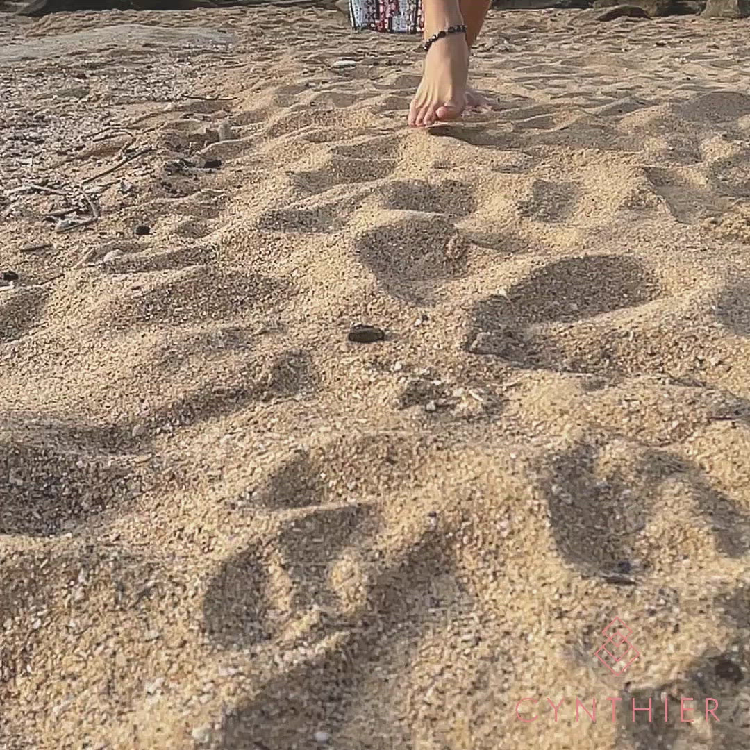 Neomi lapis lazuli anklet, blue stone anklet walking barefoot on the beach.