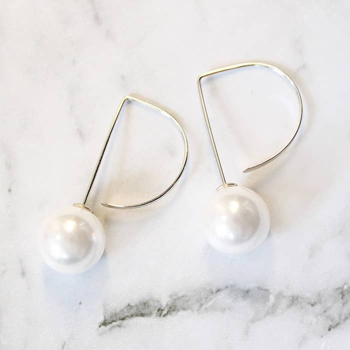 Affordable Pearl Threader Romee Earrings in silver on grey marble