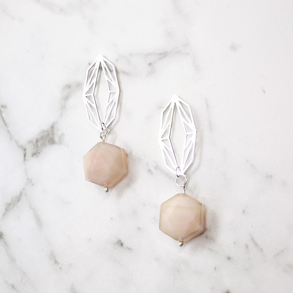 Beige Ava hexagonal drop earrings on white