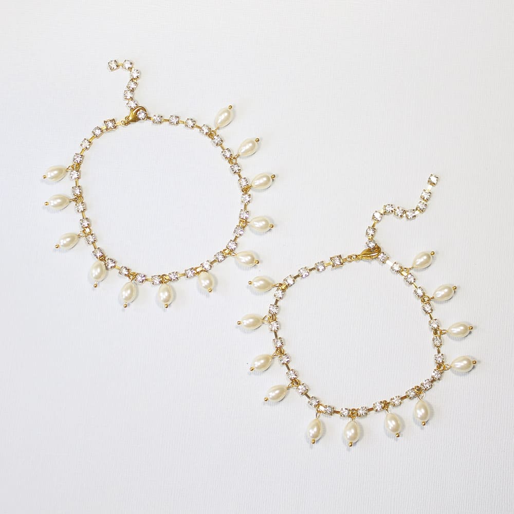 Avery dainty pearl anklets gold and ivory pearls on blue background