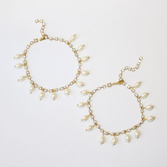 Avery dainty pearl anklets gold and ivory pearls on blue background