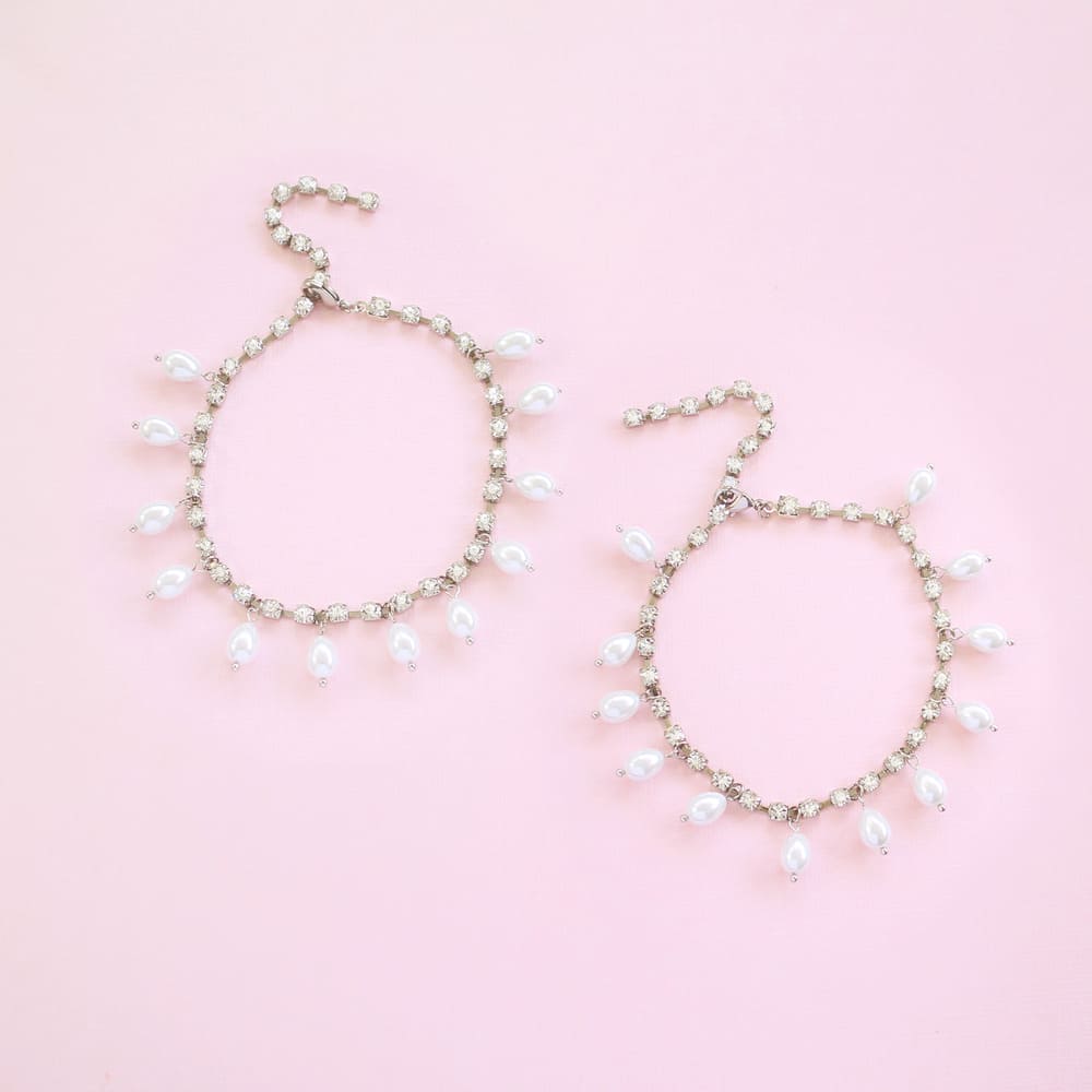 Avery dainty pearl anklets silver and off white pearls on pink background