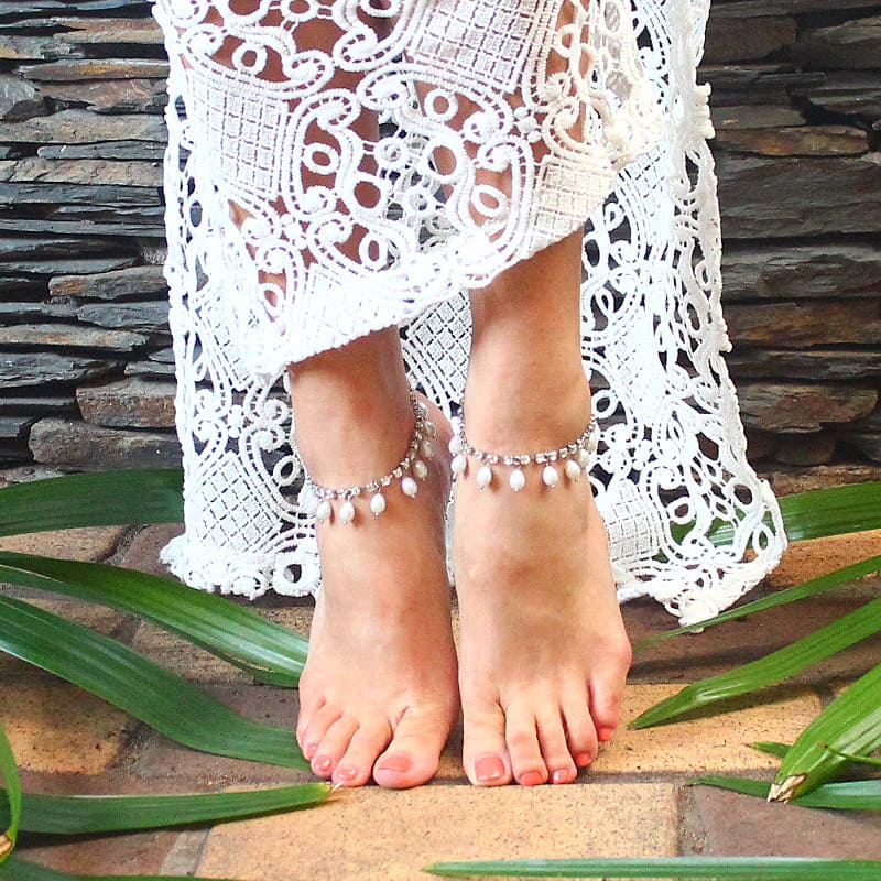 Avery dainty pearl anklets silver and off white pearls worn barefoot