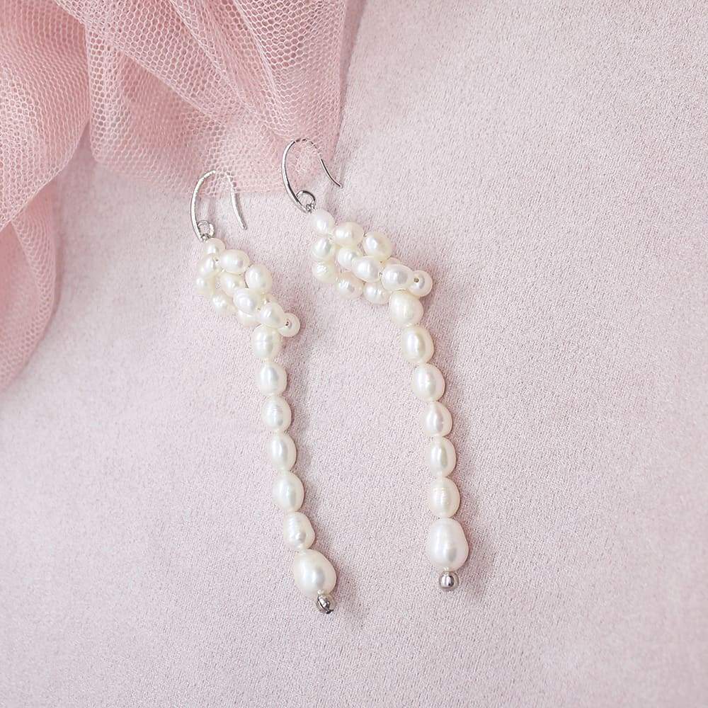Bekki freshwater pearl loop earrings on pink