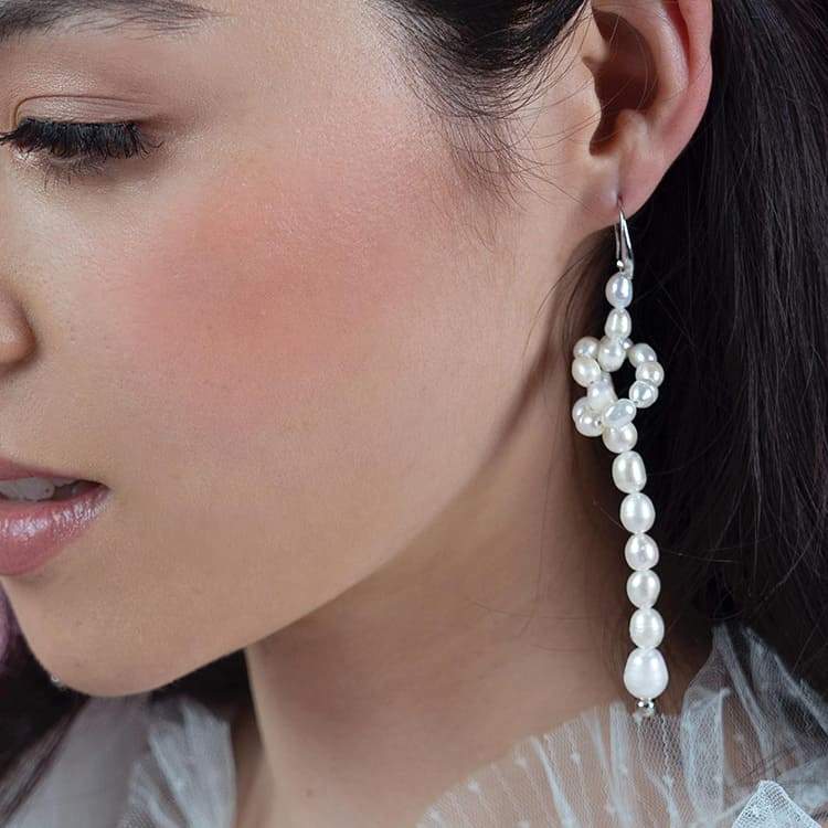 Bekki freshwater pearl loop earrings from left