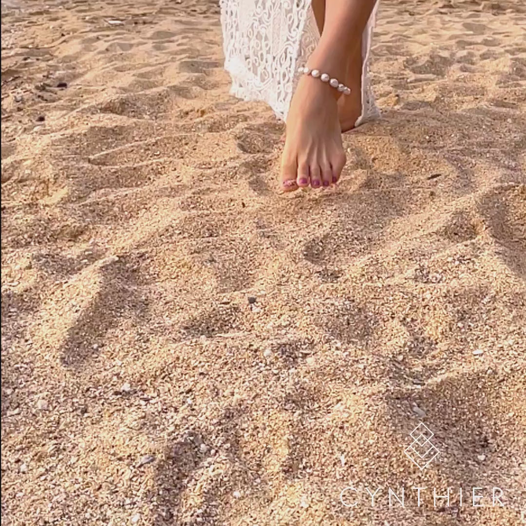 Umiko freshwater pearl and gold anklet walking barefoot on the sand
