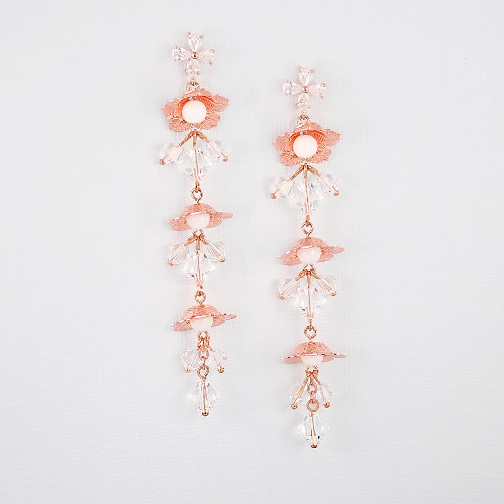 Rose gold Dahlia Flower Dangle Bridal Earrings on grey