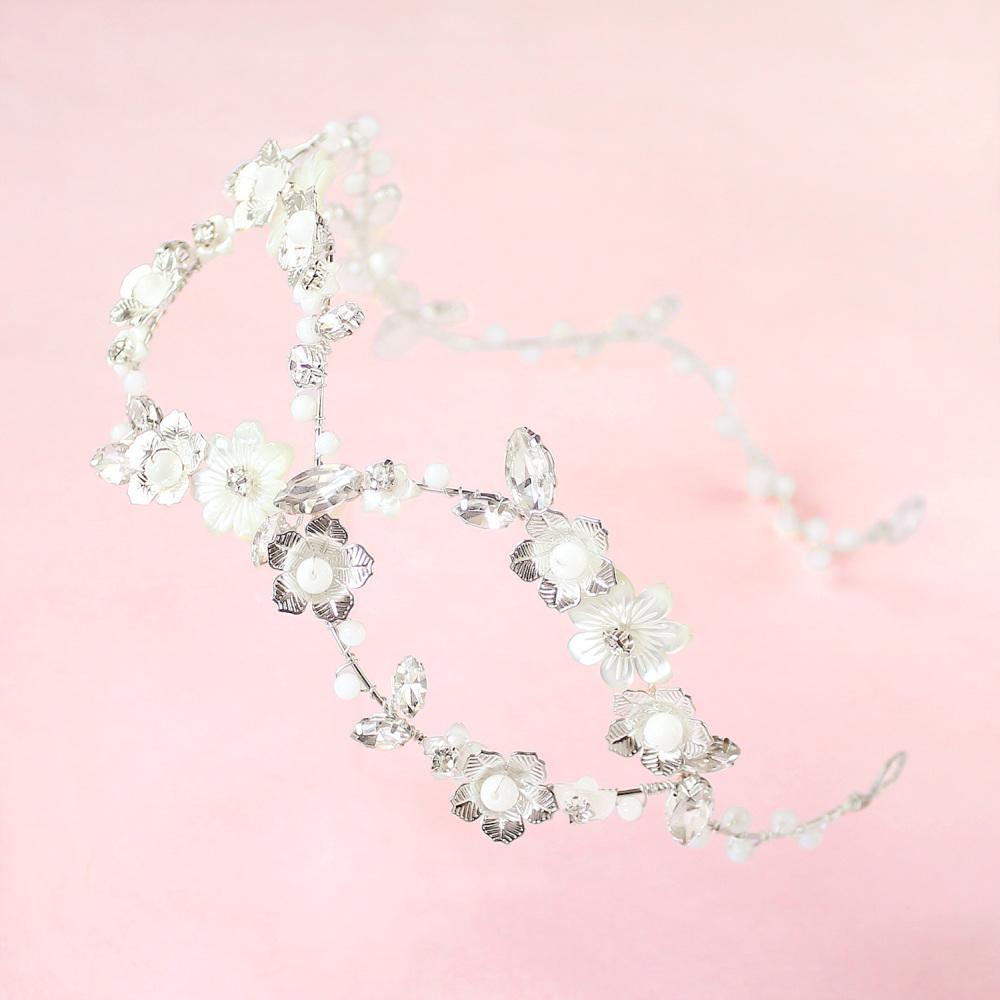 Silver Dahlia Infinity Floral Bridal Crown on pink