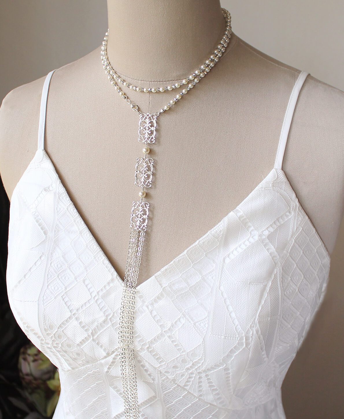 Silver Ember Bridal Backdrop Necklace on mannequin
