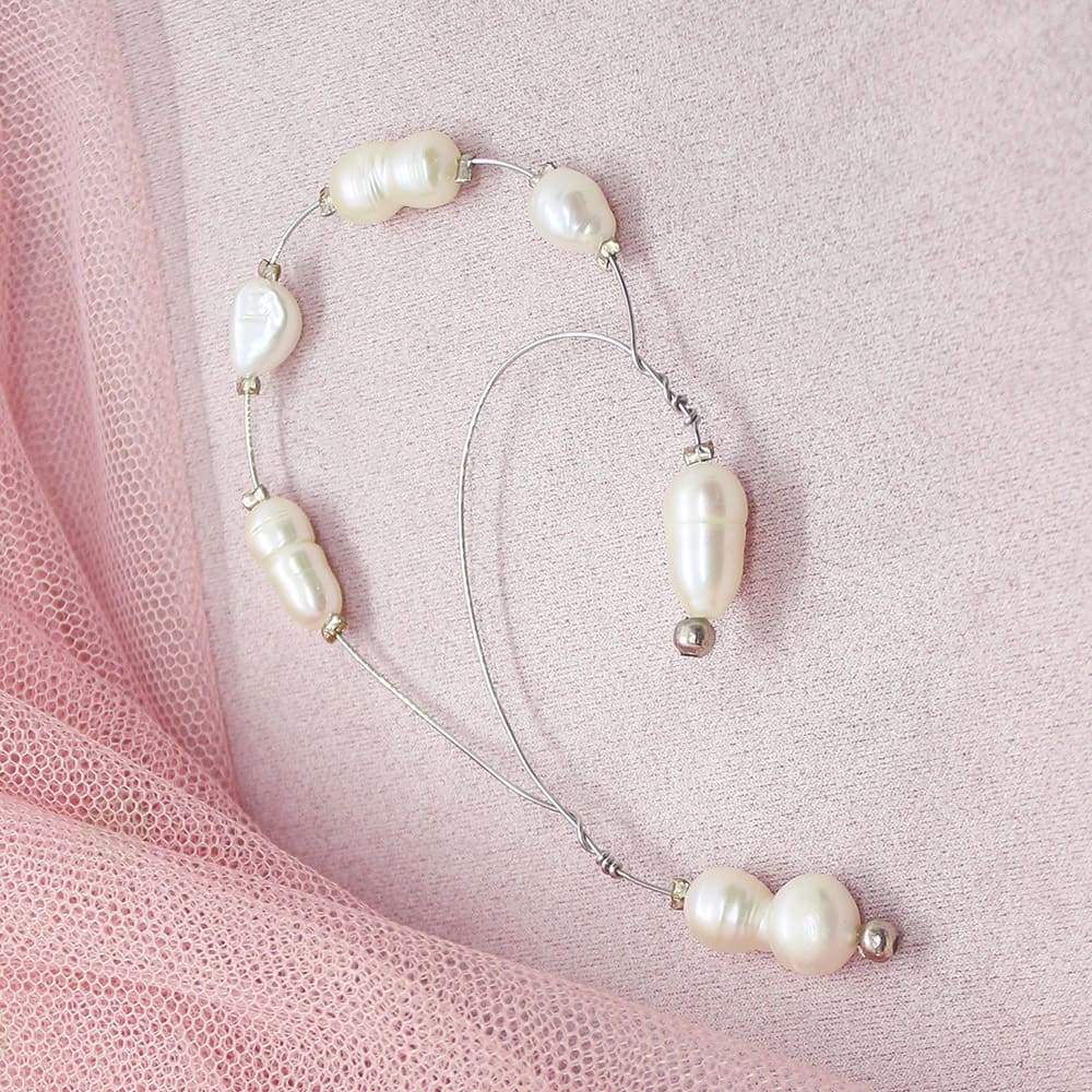 Silver Fallon Freshwater Pearl Ear Climber on pink