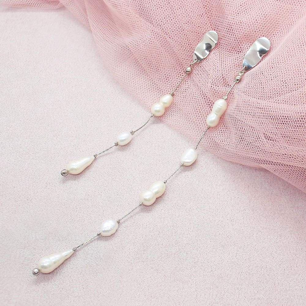 Silver Fallon Freshwater Pearl Long Earrings on pink