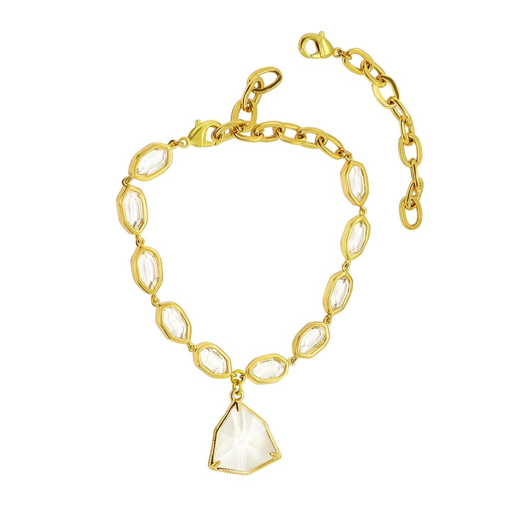 Faven gold and crystal bracelet with anklet chain extension on white background