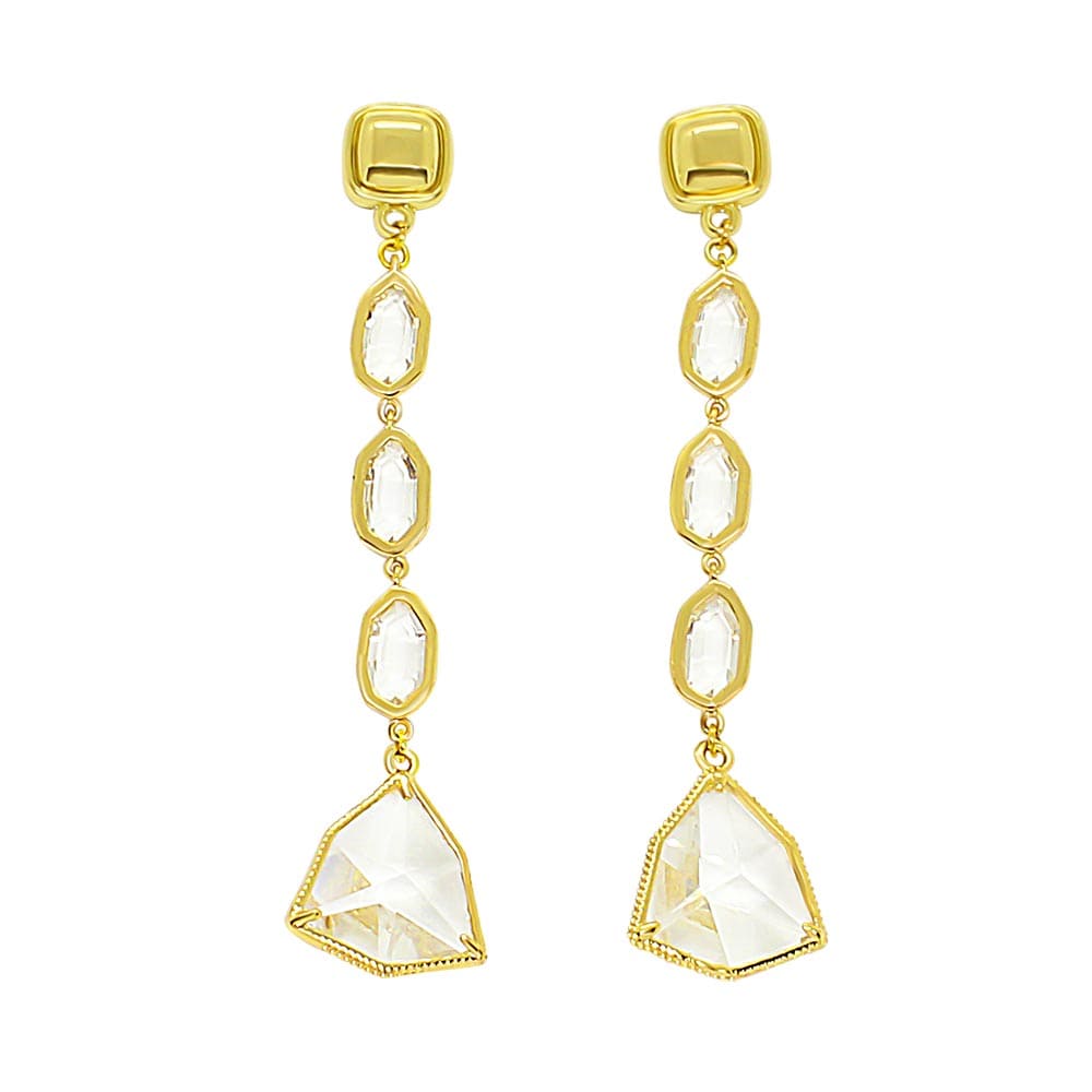 Faven modern gold and crystal dangle earrings on white background