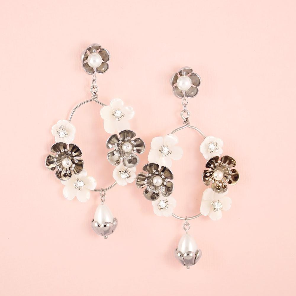 Silver Felicity Floral Bridal Earrings on pink